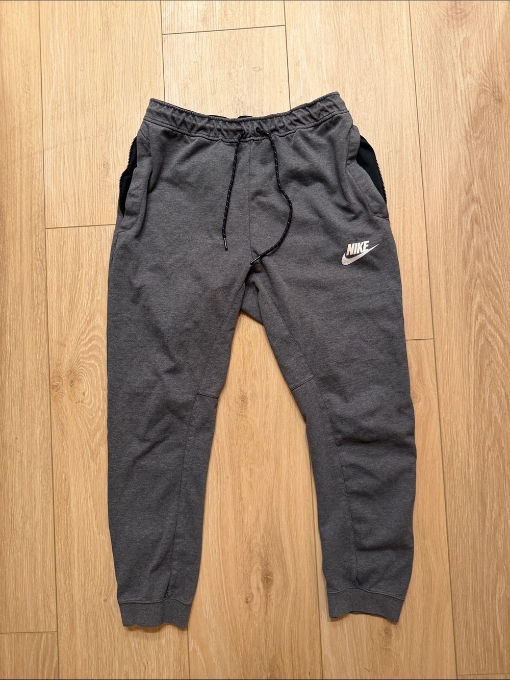 Nike Men's Charcoal Gray Joggers with White Swoosh